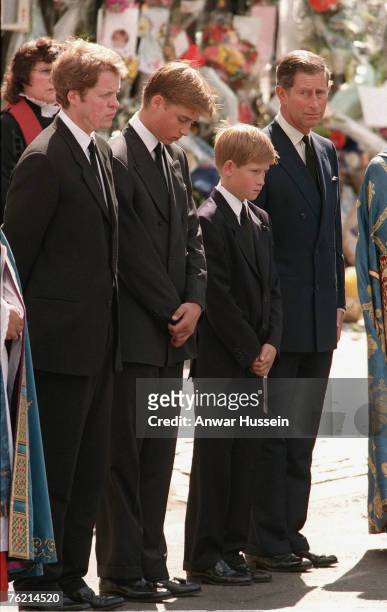 Earl Spencer, Prince William, Prince Harry and Prince Charles follow the coffin to the funeral of Diana, Princess of Wales on September 6, 1997 in...