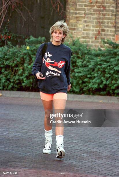 Princess Diana, Princess of Wales, wearing Virgin Atlantic sweatshirt, leaves Chelsea Harbour Club, London in November, 1995.