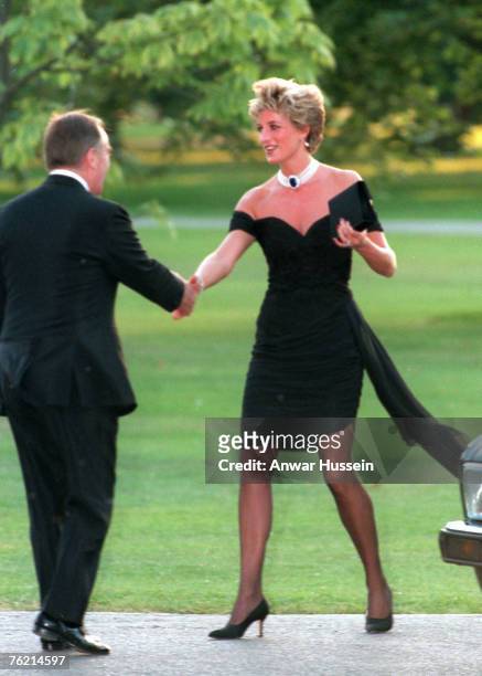 Diana, Princess of Wales, wearing a stunning black dress commissioned from Christina Stambolian, attends the Vanity Fair party at the Serpentine...