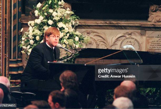 Sir Elton John sings "Candle In The Wind" at the funeral of Diana, Princess of Wales on September 6, 1997.