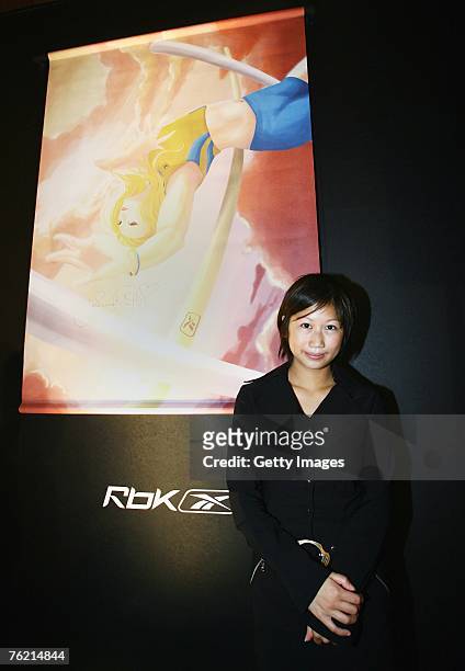 Artist Yosh poses during a Reebok Press Conference to reveal seven manga-styled images of Carolina Kluft on her arrival in Osaka for the World...