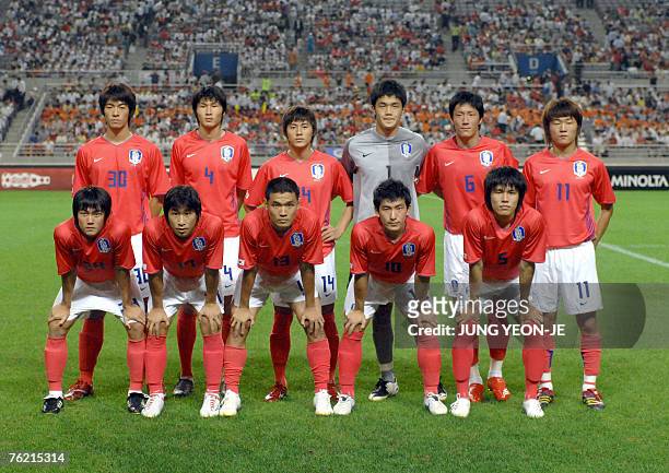 South Korean Olympic national team players pose before the first game against Uzbekistan in the final round of Asian qualifying for the 2008 Beijing...