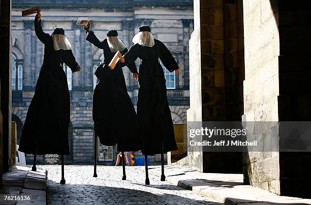 Universal Arts and Polish Cultural Institute perform Macbeth on stilts, near the Royal Mile during the Edinburgh Fringe Festival on August 22, 2007...