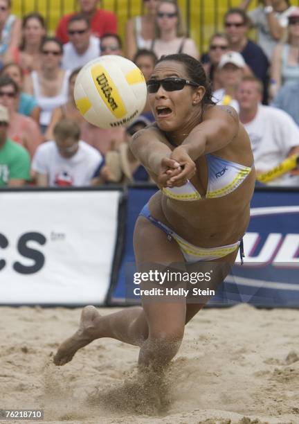 Jenny Johnson Jordan digs the ball during the women's finals against Angie Akers and Brooke Hanson in the AVP Chicago Open at North Avenue Beach on...