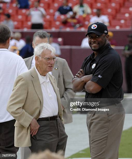 Chairman Dan Rooney and head coach Mike Tomlin of the Pittsburgh Steelers talk on the sidelines prior to a preseason game on August 18, 2007 against...