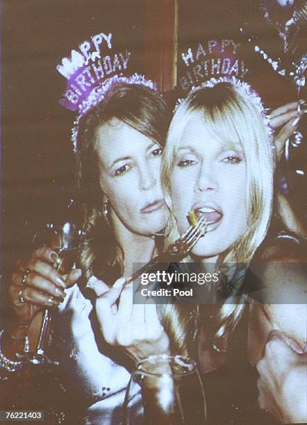 Photograph of Elizabeth Laughin and Lana Clarkson taken at a party is displayed during Phil Spector's murder trial at Los Angeles Superior Court on...