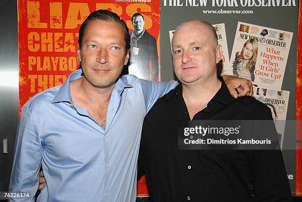 Scott Anderson and John Falk arrive during the premiere of "The Hunting Party" at the Paris Theater on August 22, 2007 in New York City.