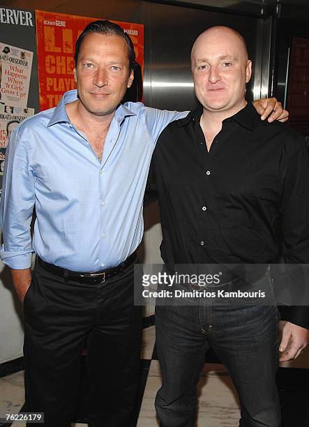 Scott Anderson and John Falk arrive during the premiere of "The Hunting Party" at the Paris Theater on August 22, 2007 in New York City.