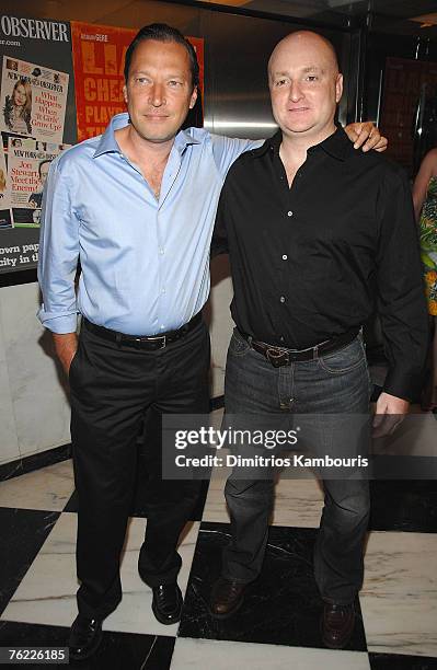 Scott Anderson and John Falk arrive during the premiere of "The Hunting Party" at the Paris Theater on August 22, 2007 in New York City.