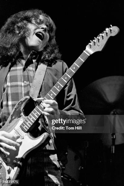 Irish blues guitarist Rory Gallagher performs at Alex Cooley's Electric Ballroom on December 3, 1975 in Atlanta, Georgia.