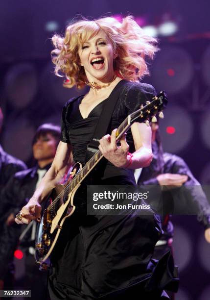 Madonna performs on stage during the Live Earth concert held at Wembley Stadium on July 7, 2007 in London. Live Earth is a 24-hour, 7-continent...