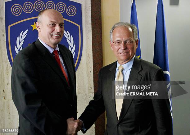 Envoy for Kosovo status talks Wolfgang Ischinger shakes hands with Kosovo Prime Minister Agim Ceku, 23 August 2007. Ischinger is on a two-day visit...