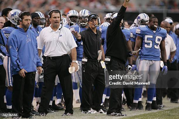 Head Coach Rod Marinelli of the Detroit Lions instructs players during the pre-season game against the Cleveland Browns at Cleveland Browns Stadium...