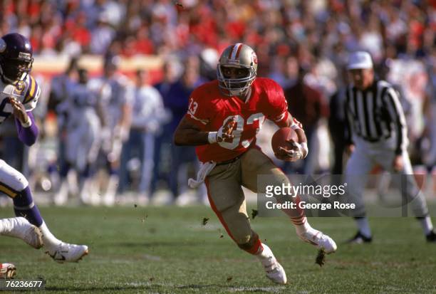 Running back Roger Craig of the San Francisco 49ers finds room to run against the Minnesota Vikings during the 1989 NFC Divisional Playoffs at...