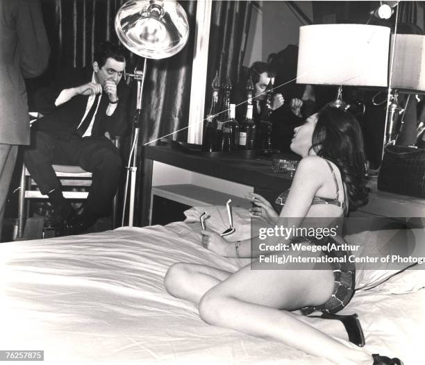 American film director Stanley Kubrick directs British actress Tracy Reed in a scene from Kubrick's film 'Dr. Strangelove, Or How I Learned to Stop...