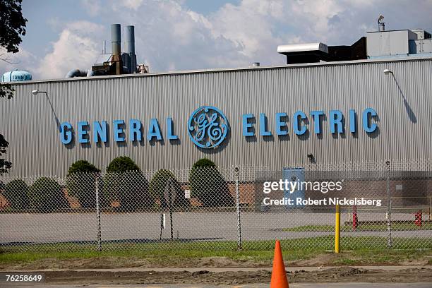 General Electric logo hangs on the side of a GE factory that produces electrical capacitors that once used, buried and discharged cancer linked...