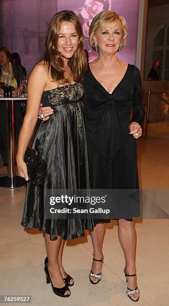 Actress Alexandra Neldel and Bertelsmann Vice-Chairwoman Liz Mohn attend the UFA 90th Birthday Gala at the Bertelsmann representation August 23, 2007...