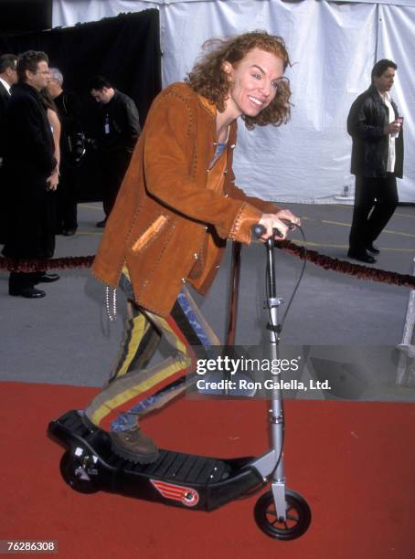 Comedian Carrot Top scooting down the red carpet at the 29th Annual American Music Awards on January 9, 2002 at the Shrine Auditorium in Los Angeles,...