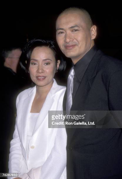 Actor Chow Yun Fat and wife Jasmine Chow attend the "Anna and the King" Hollywood Premiere on December 15, 1999 at Mann's Chinese Theatre in...