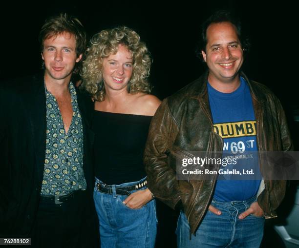 Actor Dana Carvey, wife Paula Swaggerman and Jon Lovitz being photographed on August 8, 1988 at Ed Debevic's Restaurant in West Hollywood, California.