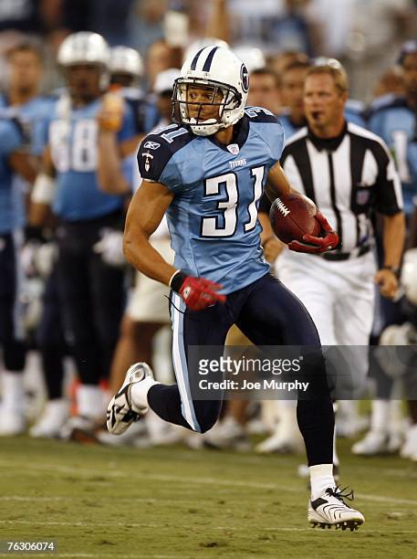 Cortland Finnegan of the Tennessee Titans returns a punt during a preseason game on August 11, 2007 at LP Field in Nashville, Tennessee. The Redskins...