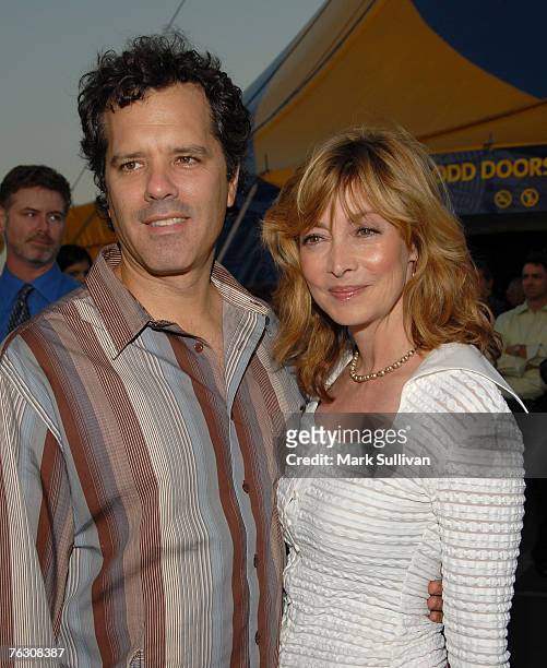 Dr. Tom Apostle and actress Sharon Lawrence arrives at opening night of Cirque du Soleil - Corteo held in Inglewood, California on August 23, 2007.