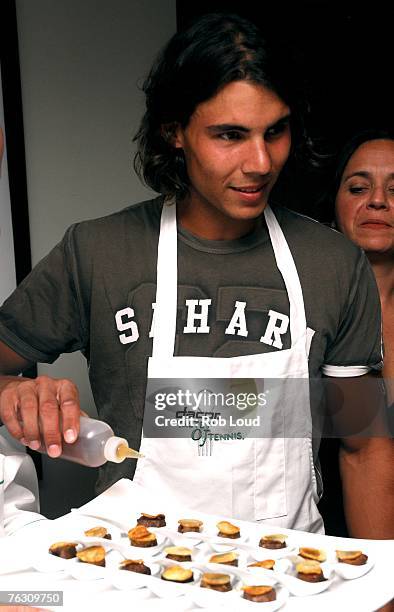 Tennis player Rafael Nadal helps prepare food at the 8th annual "Dacor Taste Of Tennis" charity event at the W Hotel August 23, 2007 in New York City.