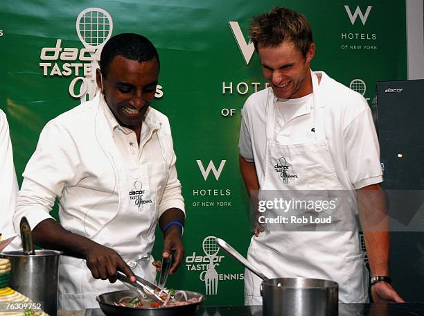 Tennis player Andy Roddick helps chef Marcus Samuelsson prepare food at the 8th annual "Dacor Taste Of Tennis" charity event at the W Hotel August...