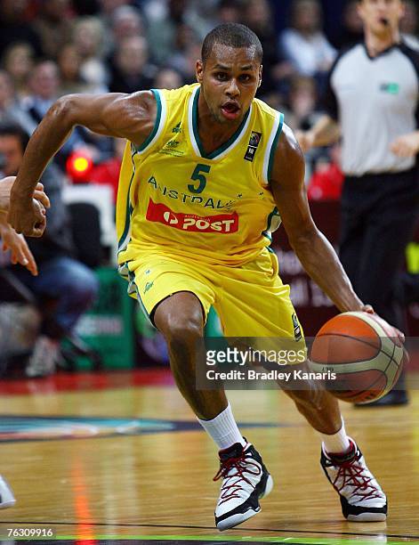Patrick Mills of the Boomers dribbles during game three of the 2007 FIBA Oceania Men's Championship between the Australian Boomers and the New...