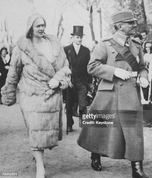 King Alexander I and Queen Marie of Yugoslavia attend the unveiling of a sculpture on Armistice Day in Belgrade, created as a tribute to France by...