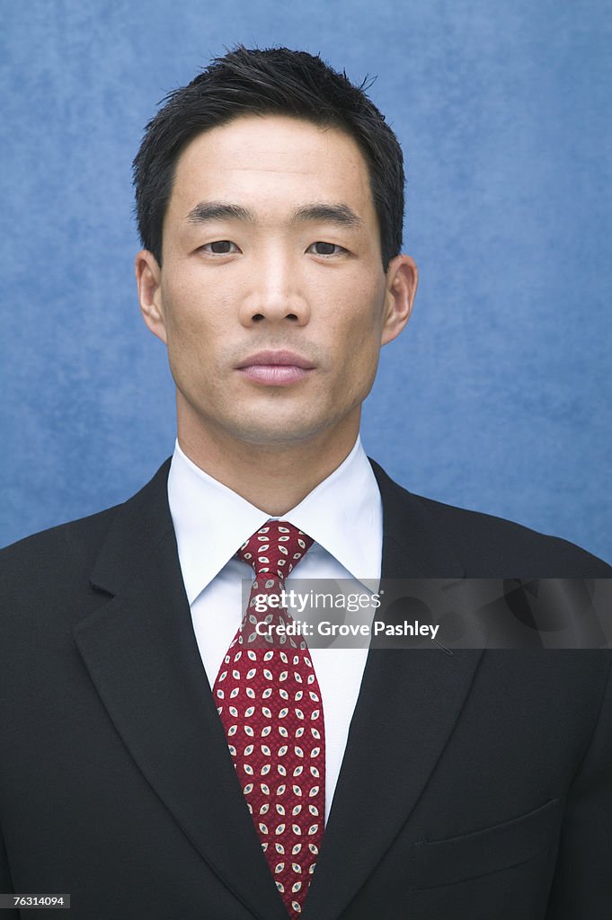 Mid adult businessman, portrait, upper half