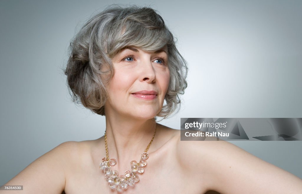 Mature woman smiling, close-up