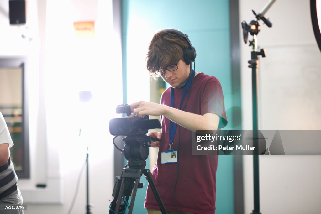 Student Camera Man Young Male College Student Filming In Tv Studio High-Res Stock Photo ...