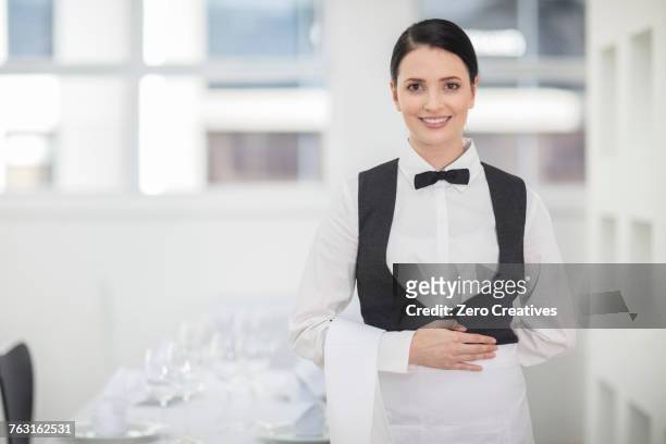 portrait of waitress in restaurant - ウエイトレス ストックフォトと画像