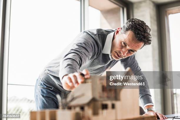 architect working on architectural model - architect bildbanksfoton och bilder