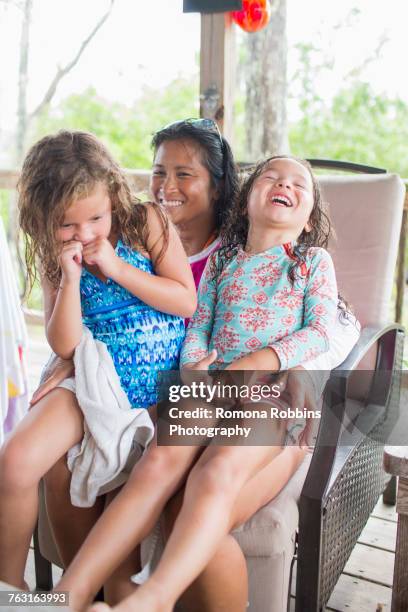 Mother laughing with daughters