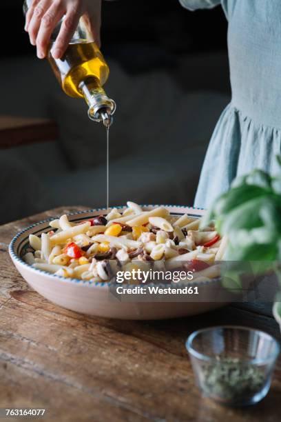 close-up of woman making italian pasta - olive oil stock pictures, royalty-free photos & images