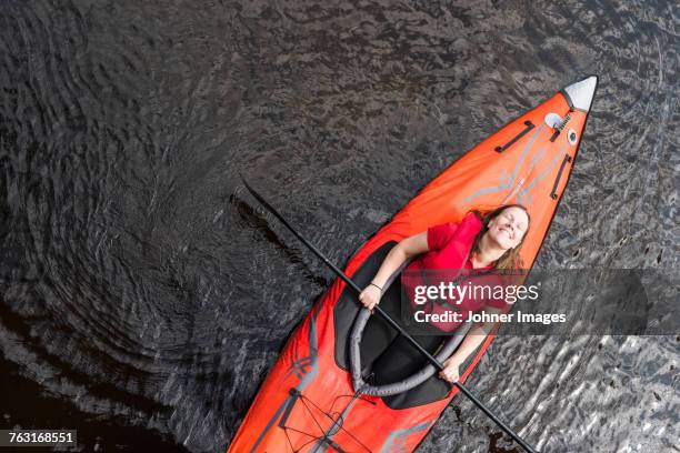 woman relaxing on kayak - västra götaland county fotografías e imágenes de stock