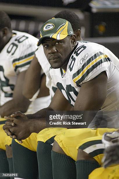 Bubba Franks of the Green Bay Packers looks on from the bench during the game against the Pittsburgh Steelers on August 11, 2007 at Heinz Field in...