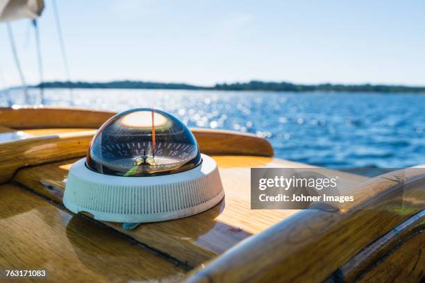 compass on boat - sailing navigation stock pictures, royalty-free photos & images