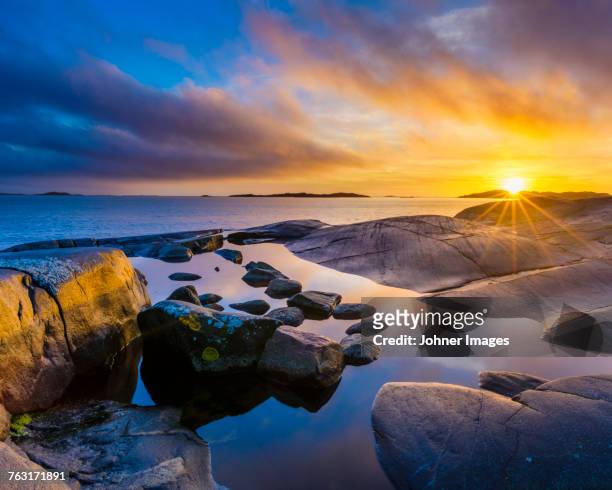 sunset at coast - sweden archipelago stock pictures, royalty-free photos & images