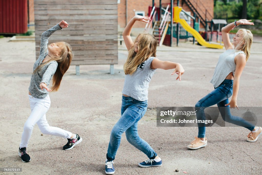 Girls dancing together