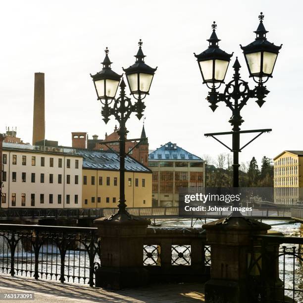 old-fashioned street lights - norrkoping stock pictures, royalty-free photos & images