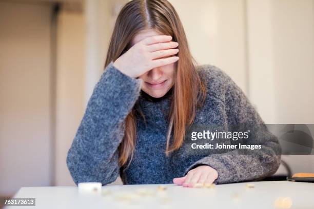 depressed woman - crying woman stock-fotos und bilder