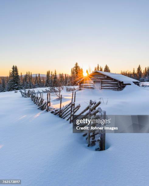 wooden barn in winter landscape - sverige vinter bildbanksfoton och bilder