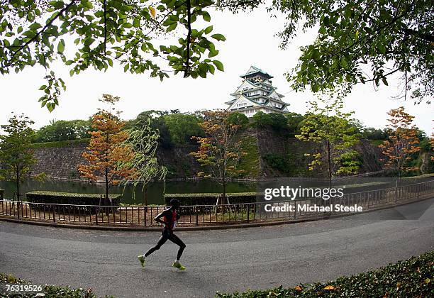 Runner competes through the city streets during the Men's Marathon on day one of the 11th IAAF World Athletics Championships on August 25, 2007 at...