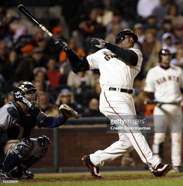 Barry Bonds of the San Francisco Giants hits his 761st home run off of Chris Capuano the Milwaukee Brewers during the fourth inning of a game August...