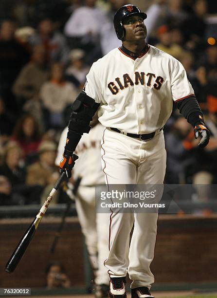 Barry Bonds of the San Francisco Giants watches his 761st home run, a solo shot off of Chris Capuano the Milwaukee Brewers during the fourth inning...