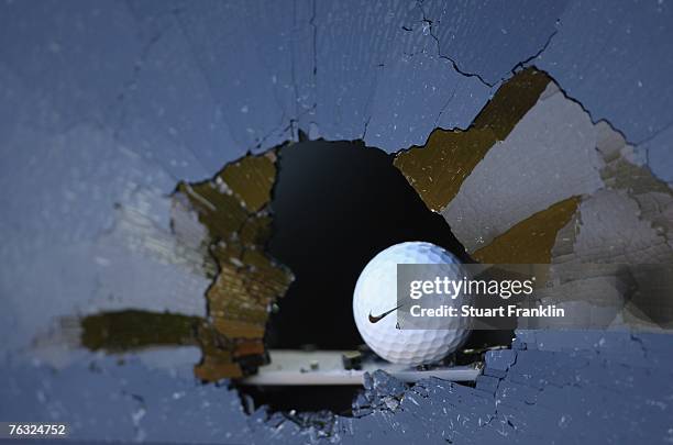 Can on the course has its window smashed by a golf ball during the third round of The KLM Open at Kennemer Golf & Country Club on August 25, 2007 in...