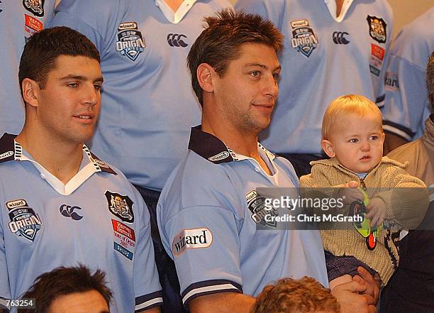 Luke Ricketson poses with Wizard Home Loans competition winner Bradley Newton during the NSW Blues State Of Origin squad team photo ahead of next...